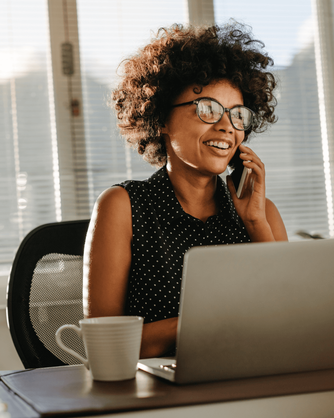 Business owner taking a call with AI receptionist support